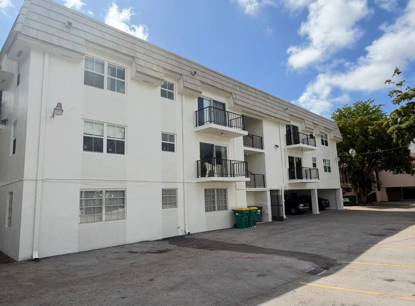 Apartment building after, fresh white paint