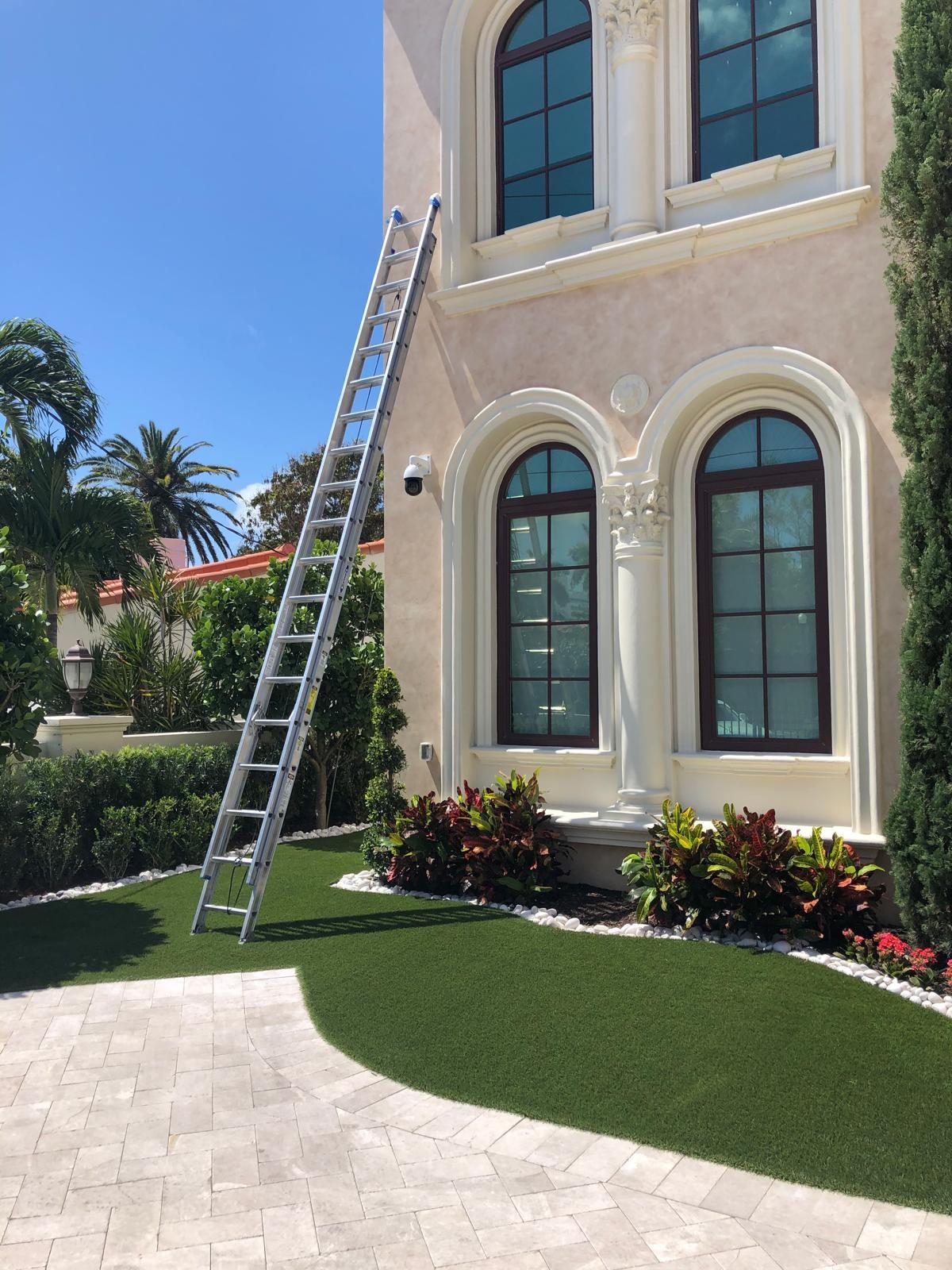 Mediterranean mansion exterior with arched windows